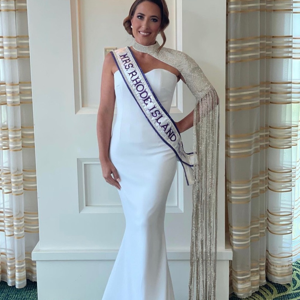 White gown with dramatic sleeve